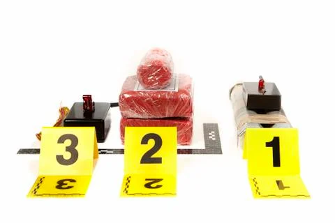 Contraband components and remote control for bomb making found by police Stock Photos