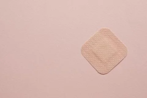 Contraceptive patch on pink background, top view. Space for text Stock Photos