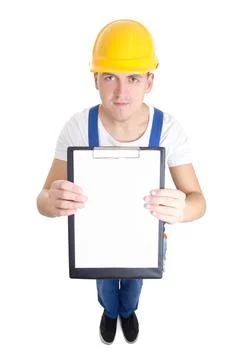 Contract concept - man in builder uniform showing clipboard with blank paper  스톡 사진
