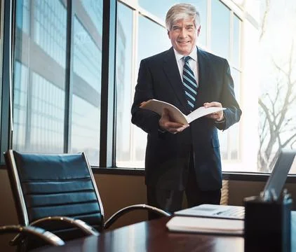 This contract needs my approval. Cropped portrait of a mature businessman Stock Photos