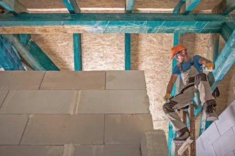 Contractor and the Construction Site.  Foto stock