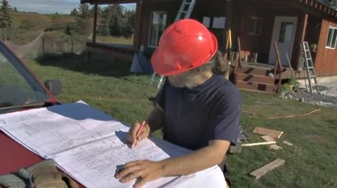 Contractor Checking Construction Plans 1 Stock Footage 8649008