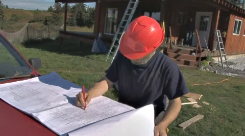Contractor Checking Construction Plans 2 Stock Footage 8650033