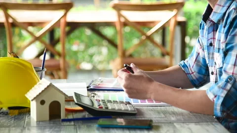 Contractor construction engineer meeting talking together on architect table at  Stock Footage 231696308