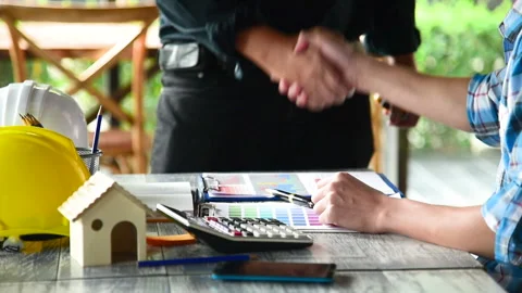 Contractor construction engineer meeting together on architect table at construc Stock Footage 231695899