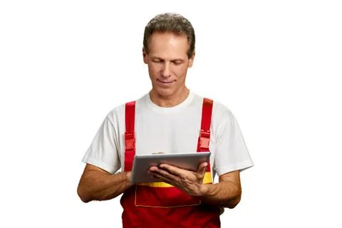 Contractor engineer man using digital tablet. Stock Photos