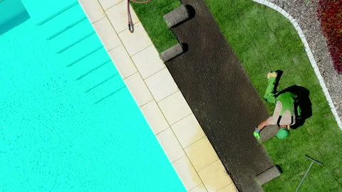 Contractor Positioning Rolls Of Sod On Ground. Video stock 138961506