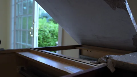 Contractor removes old kitchen countertop during home renovation project. Worker Stock Footage 322537128