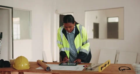 Contractor, tablet and check blueprint at construction site, inspection or Stock Footage 341566664