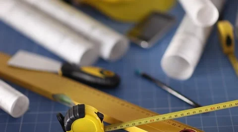 Contractor theme, blueprints, plans, hard hat, tools Stock Footage 60390242