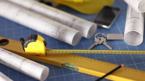 Contractor theme, blueprints, plans, hard hat, tools Stock Footage 60390243