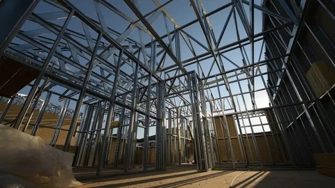 Contractor Worker in the Construction Zone Building Skeleton Frame House Stock Footage 95601583