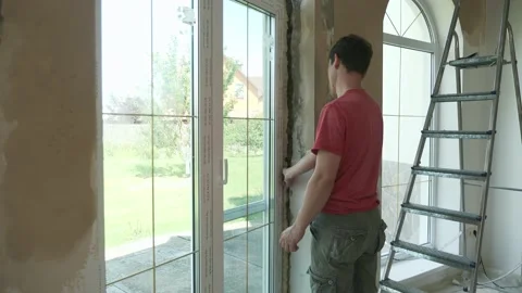 Contractor Worker Repair Arched Window Slope Wall Refurbishment Renovation Home Video stock 157719506