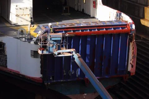 A contractor working on a car ferry Stock Photos