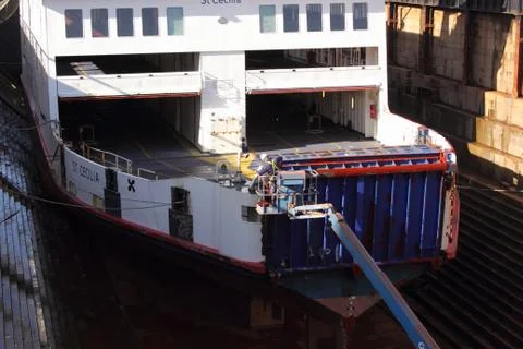 A contractor working on a car ferry Stock Photos
