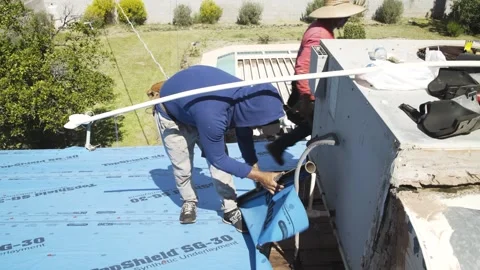 Contractor Working on the Roof Video stock 330842324