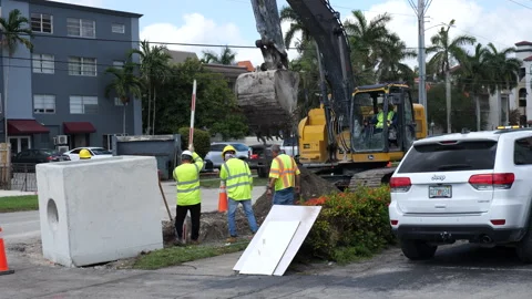 Contractors Dig Up Broken Water Line Condo Stock Footage 309714548