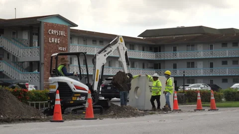 Contractors Dig Up Broken Water Line Condo Stock Footage 309714671