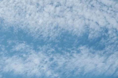 Contrail in a blue sky Stock Photos