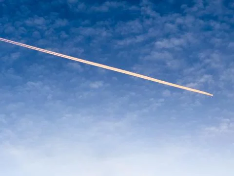 A contrail in the sky Stock Photos