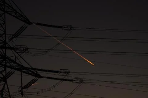 Contrail in the west. Stock Photos