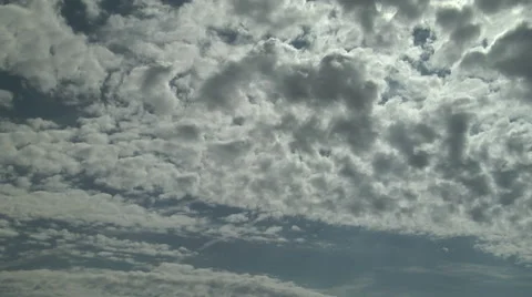 Contrails Above Altocumulus Stock Footage 54720917