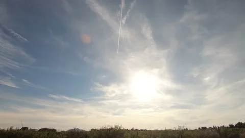 Contrails and Clouds as night falls in New Mexico. Stock Footage 155415991