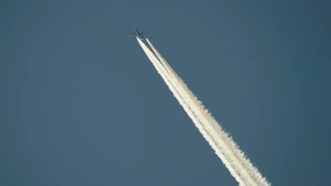 Contrails in the blue sky Stock Footage 163985975