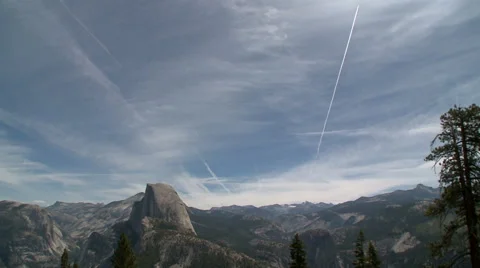 Contrails over Half Dome Stock Footage 54708578