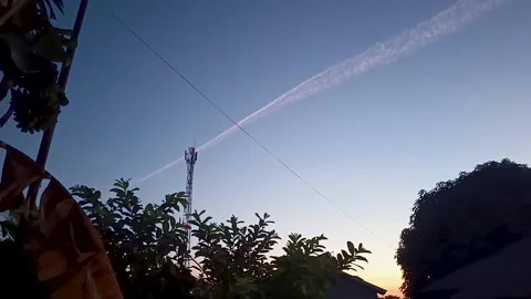 Contrails, from passing jet planes Stock Footage 311935533