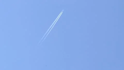 Contrails rising into the sky Video stock 336035421