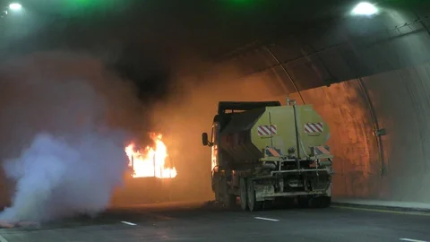 A contraption that simulates a burning car is waiting for firefighters 스톡 동영상 100596300