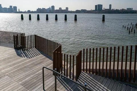 The contrast between the old wooden columns and modern Pier 57 architecture.. Фото
