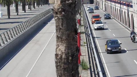 Contrast between two sides of the Highway. One empty. Another with cars Stock Footage 135780021