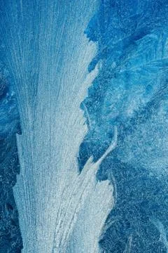Contrast frosty pattern on the window, abstract winter background. Stock Photos