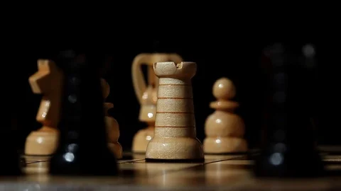 Contrast of intelligence and physical power, chessboard Stock Footage 70593146