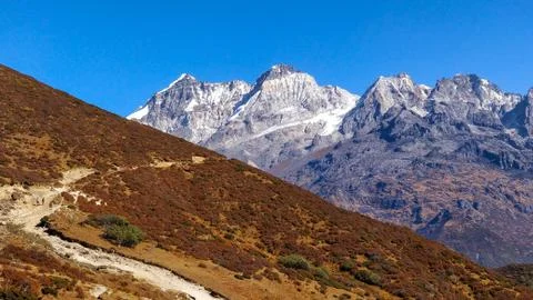 A contrast of two mountains Stock Photos