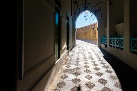 Contrastic view of the gate leading to old medina of the ancient city Asilah Stock Photos