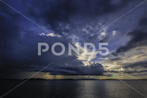 Contrasting Storm Clouds Approaching over Puget Sound Stock Photos