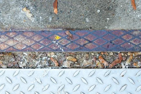 Contrasting textures of rusty and new diamond plate metal Stock Photos