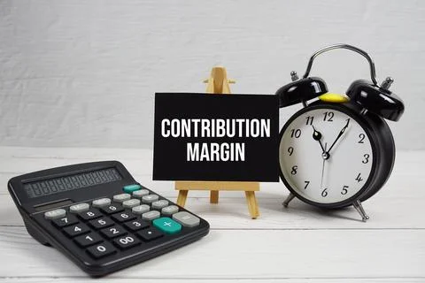 Contribution text with alarm clock and calculator on wooden background Stock Photos