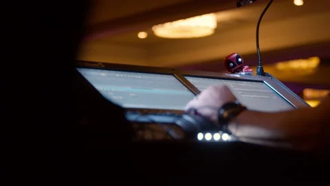 Control Booth Operator Pan from Black with Marvel Figurine Stock Footage 206996927