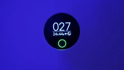 Control button on a blue smart air purifier, cycling through its modes Stock Footage 321404392