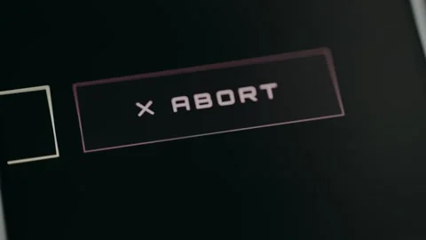 Control button labeled ABORT for canceling or stopping a current action Stock Footage 332468278