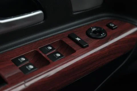 The control buttons for opening and closing windows of doors and electric con Stock Photos