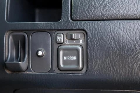 Control buttons for rear-view mirrors adjustment system, folding, a hole for  Stock Photos