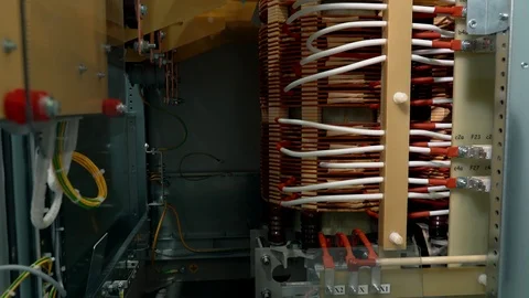Control cabinet. Internal view of the transformer cabinet. copper parts and Stock Footage 104790317