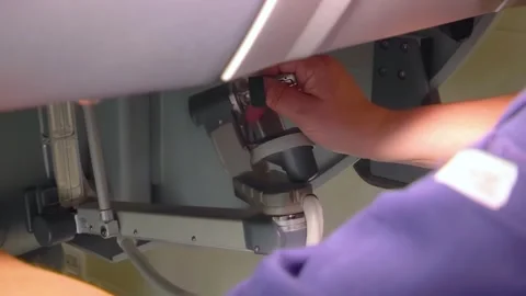 Control center of a surgical robot. In the robotic surgery operating room. Stock Footage 307491018
