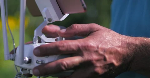 Control of a drone using a remote control and a tablet Stock Footage 78875474