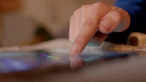 Control of the gadget through the screen, the finger presses the buttons A finge Stock Footage 295932467